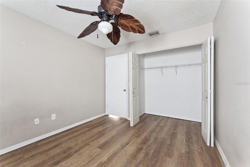 3651 North Goldenrod Road, Unit 110 Winter Park, FL 32792 - Photo 15 of 19 wooden floor in an empty room