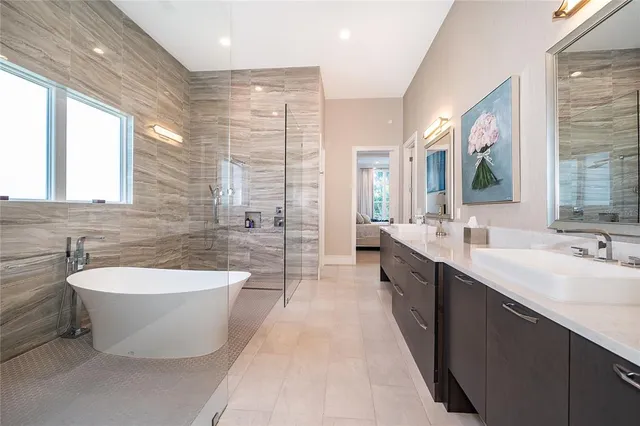 a view of roof deck with table and chairs and potted plants