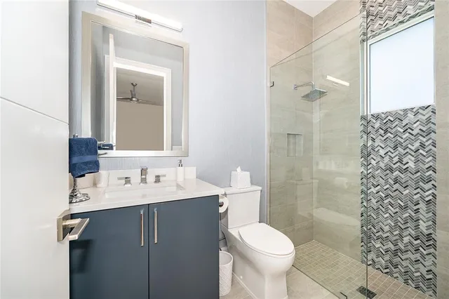 an aerial view of a house with outdoor space