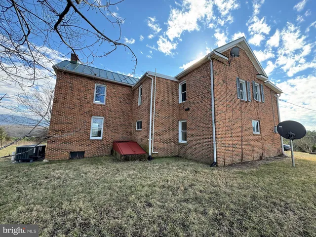 a view of entryway with wooden walls