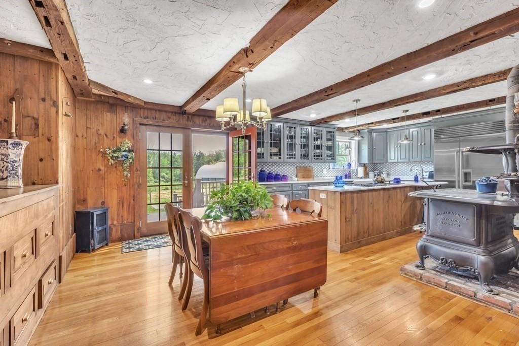 31 Washington Street Mendon, MA 01756 - Photo 20 of 40 a living room with granite countertop furniture and kitchen view