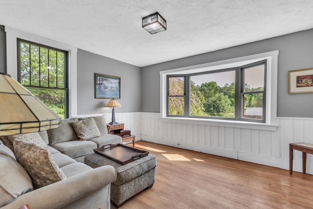 31 Washington Street Mendon, MA 01756 - Photo 21 of 40 a living room with furniture and a window