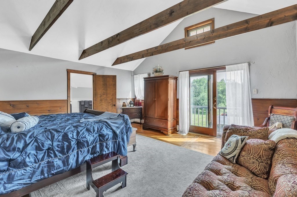 31 Washington Street Mendon, MA 01756 - Photo 24 of 40 a bed room with a bed and a couch