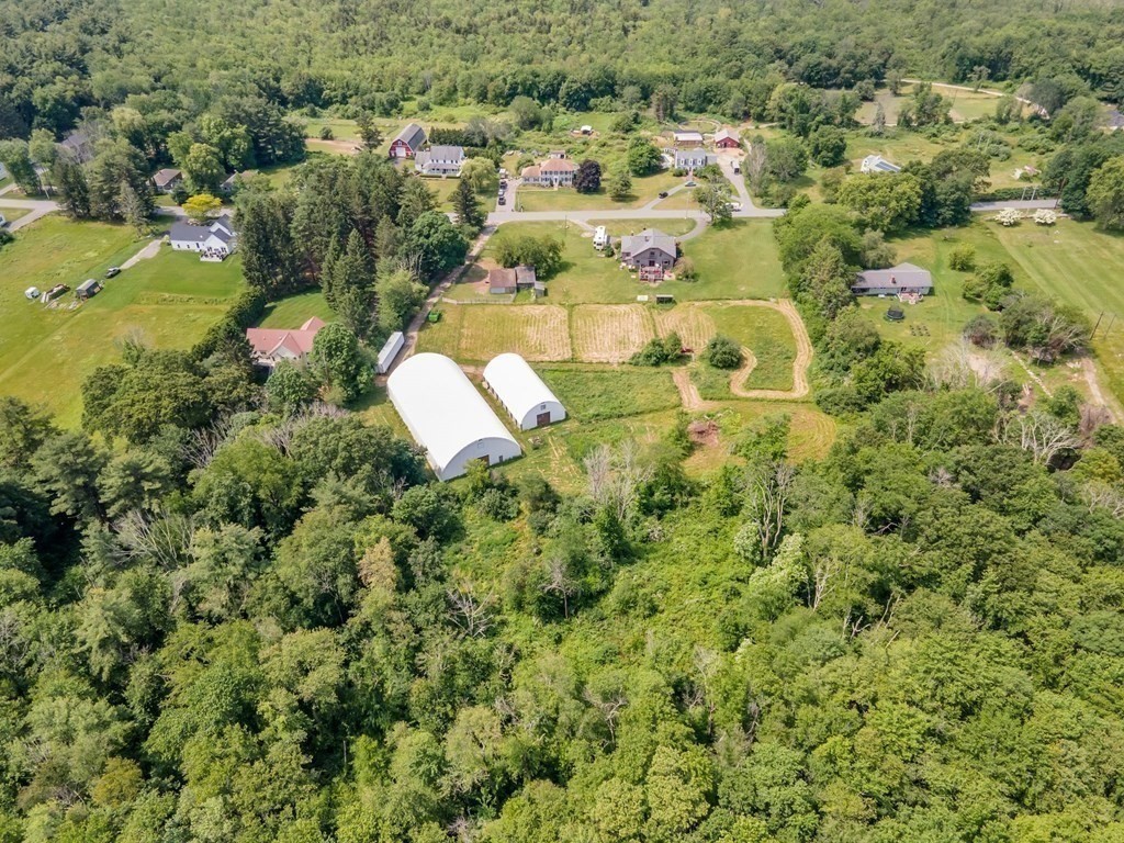 31 Washington Street Mendon, MA 01756 - Photo 37 of 40 an aerial view of residential houses with outdoor space and trees