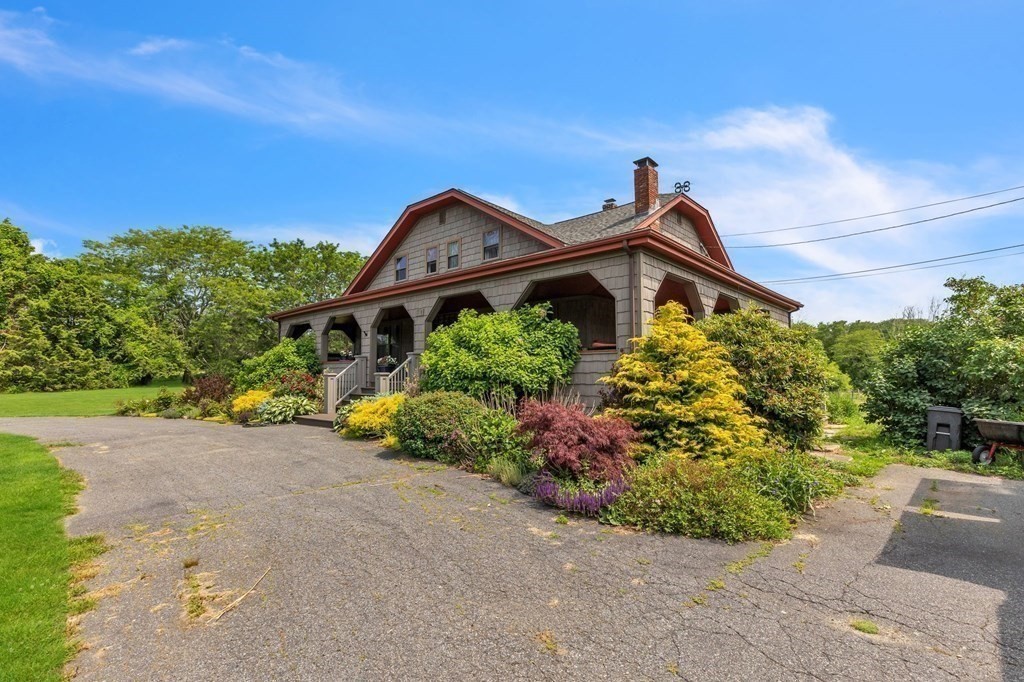 31 Washington Street Mendon, MA 01756 - Photo 40 of 40 a front view of a house with a yard