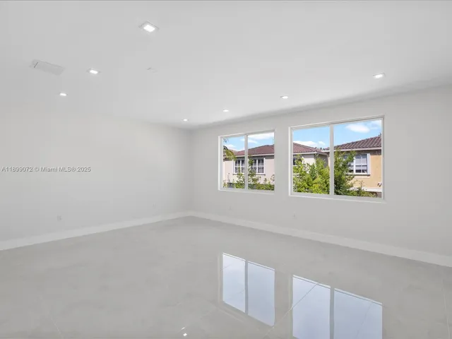a bathroom with a bathtub and a sink