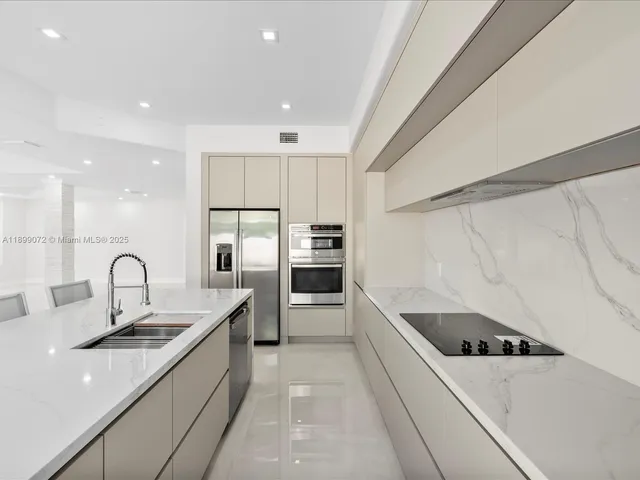 a view of entryway and hall with a front door