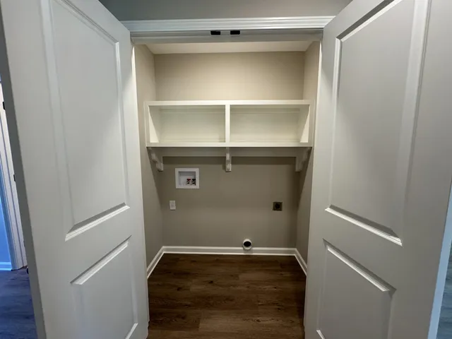 a view of an empty walk in closet