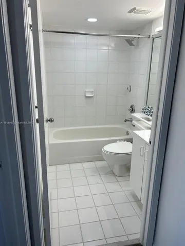 a view of an empty room with a balcony