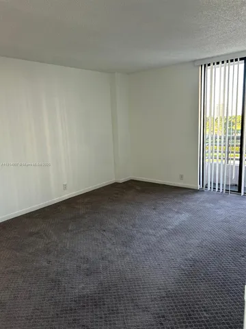 a view of a bathroom from a hallway