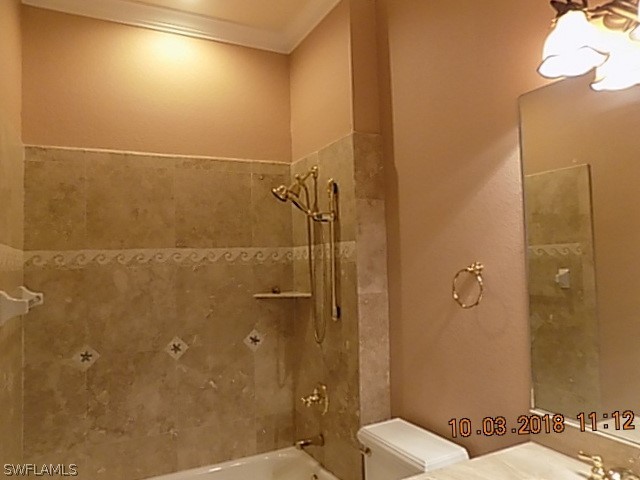 19220 La Serena Drive Estero, FL 33967 - Photo 12 of 27 a bathroom with a shower and toilet