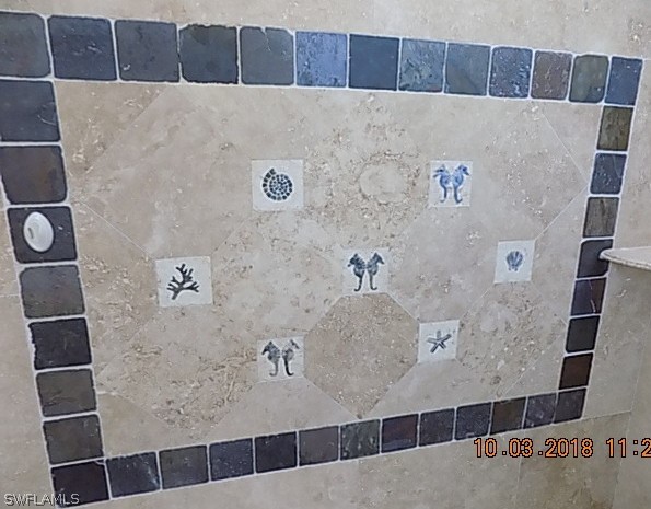 19220 La Serena Drive Estero, FL 33967 - Photo 21 of 27 a bathroom with a bathtub