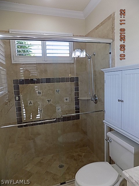 19220 La Serena Drive Estero, FL 33967 - Photo 22 of 27 a bathroom with a toilet and a shower