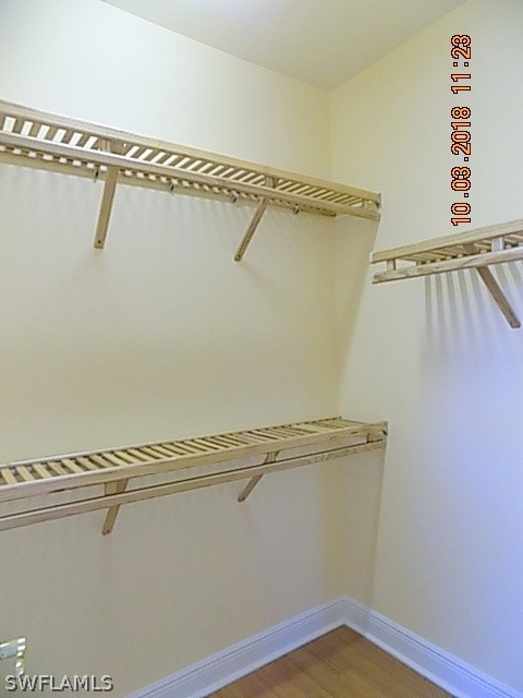 19220 La Serena Drive Estero, FL 33967 - Photo 23 of 27 a view of a room with racks on the wall