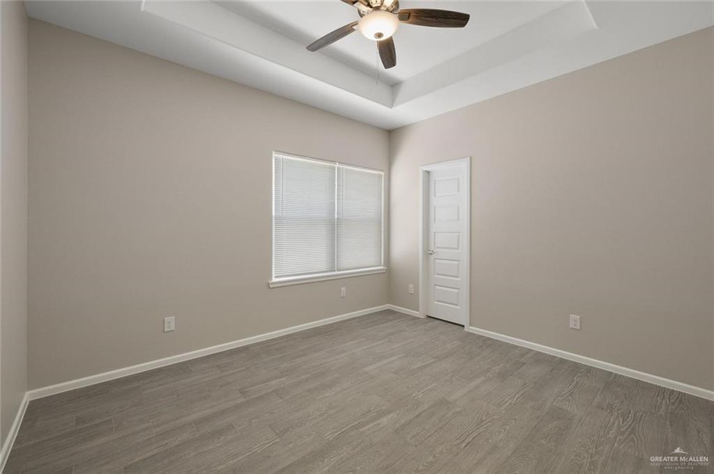 740 North Alamo Road, Unit 18 Alamo, TX 78516 - Photo 11 of 18 a view of an empty room with a window
