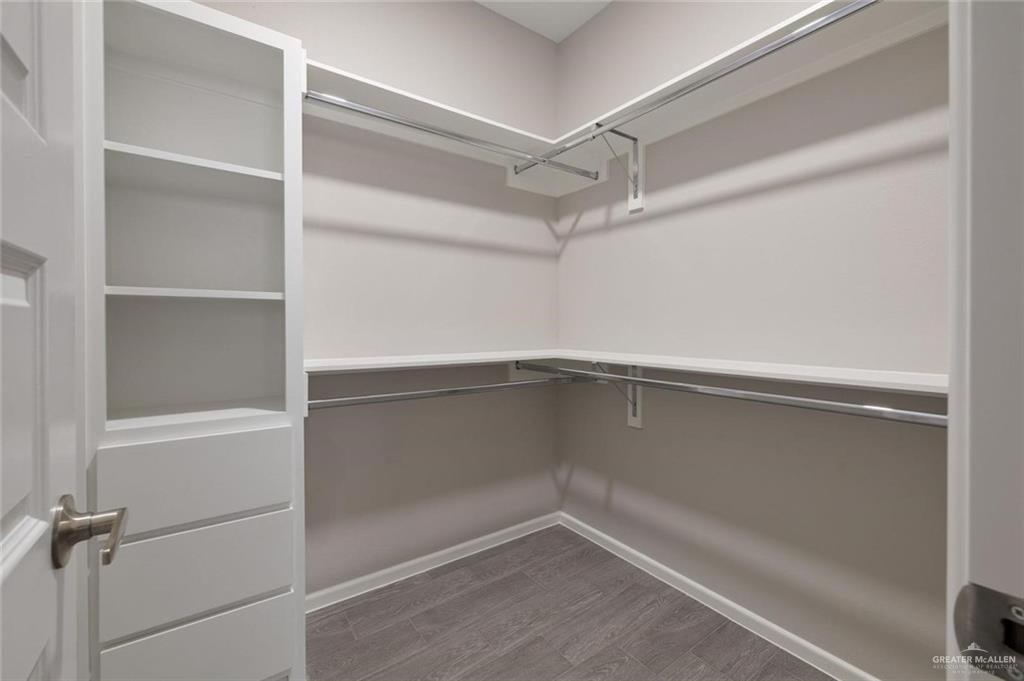 740 North Alamo Road, Unit 18 Alamo, TX 78516 - Photo 14 of 18 a empty closet with white paint