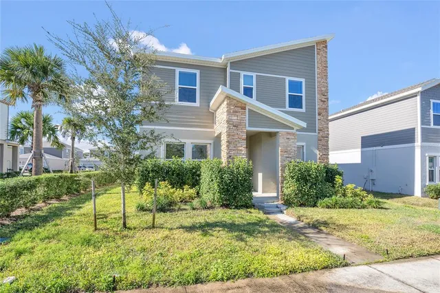a house view with a garden space