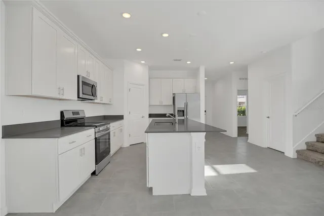 a view of empty room with windows