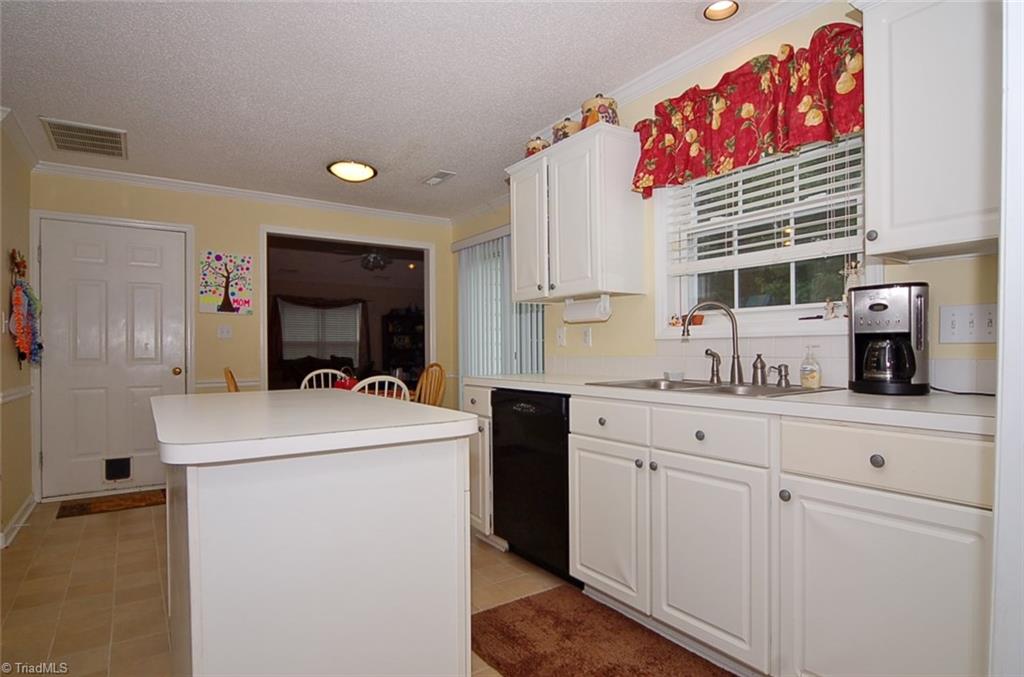 3338 Timberwolf Avenue High Point, NC 27265 - Photo 12 of 30 Another view of the kitchen