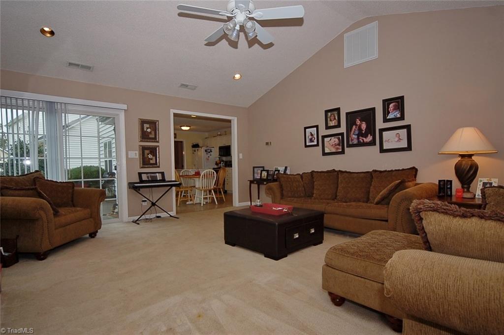 3338 Timberwolf Avenue High Point, NC 27265 - Photo 17 of 30 View to the kitchen and back patio from the living room