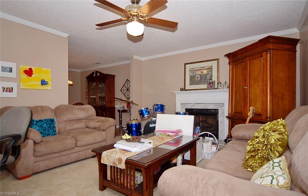 3338 Timberwolf Avenue High Point, NC 27265 - Photo 3 of 30 The formal den is off the entry.