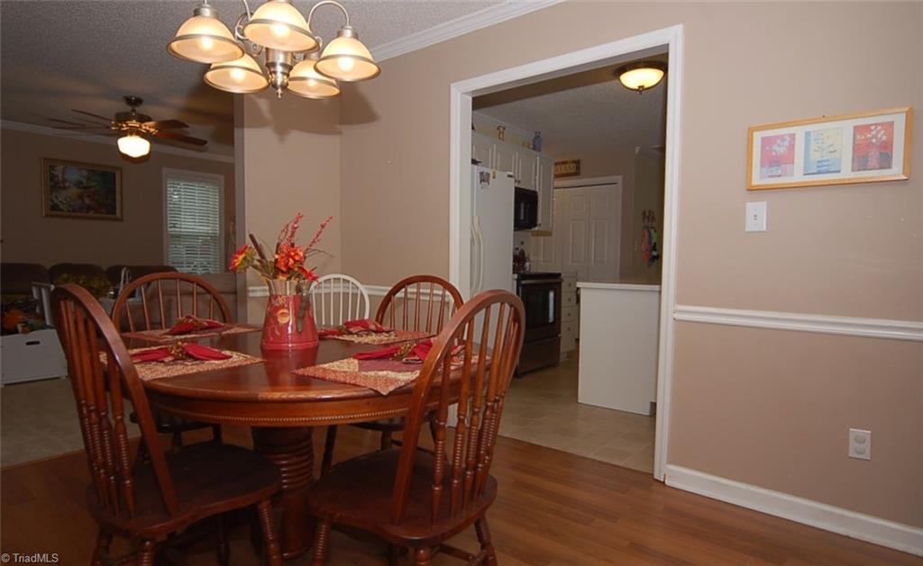 3338 Timberwolf Avenue High Point, NC 27265 - Photo 8 of 30 A view to the kitchen from the dining room