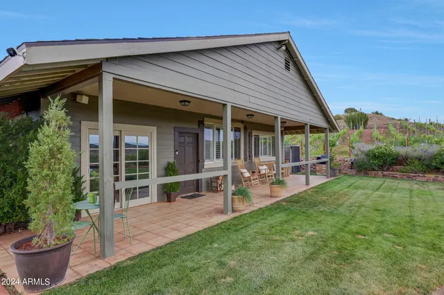 a view of a street with a yard