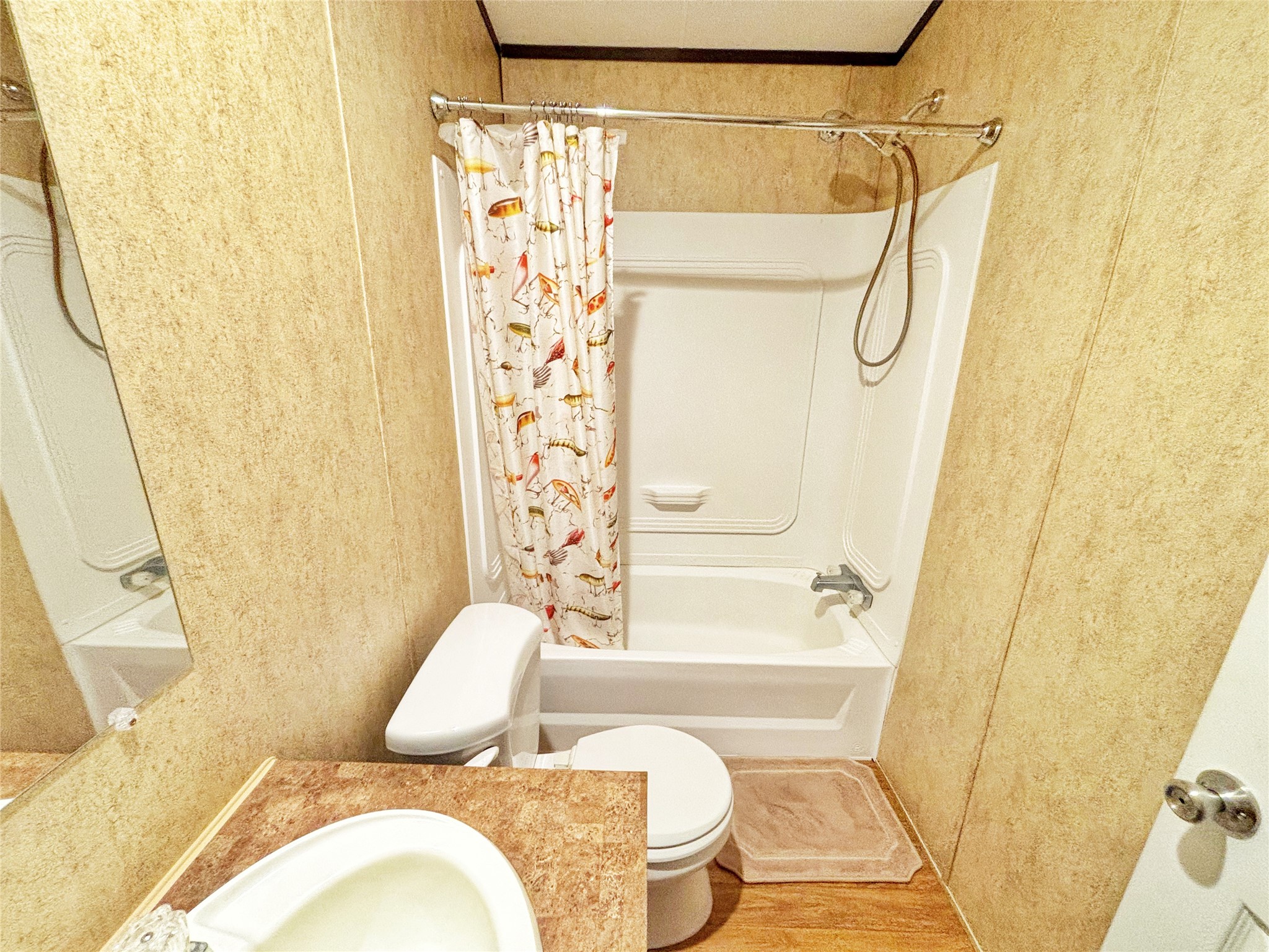 8 River Drive Trinity, TX 75862 - Photo 15 of 36 a bathroom with a sink and a shower