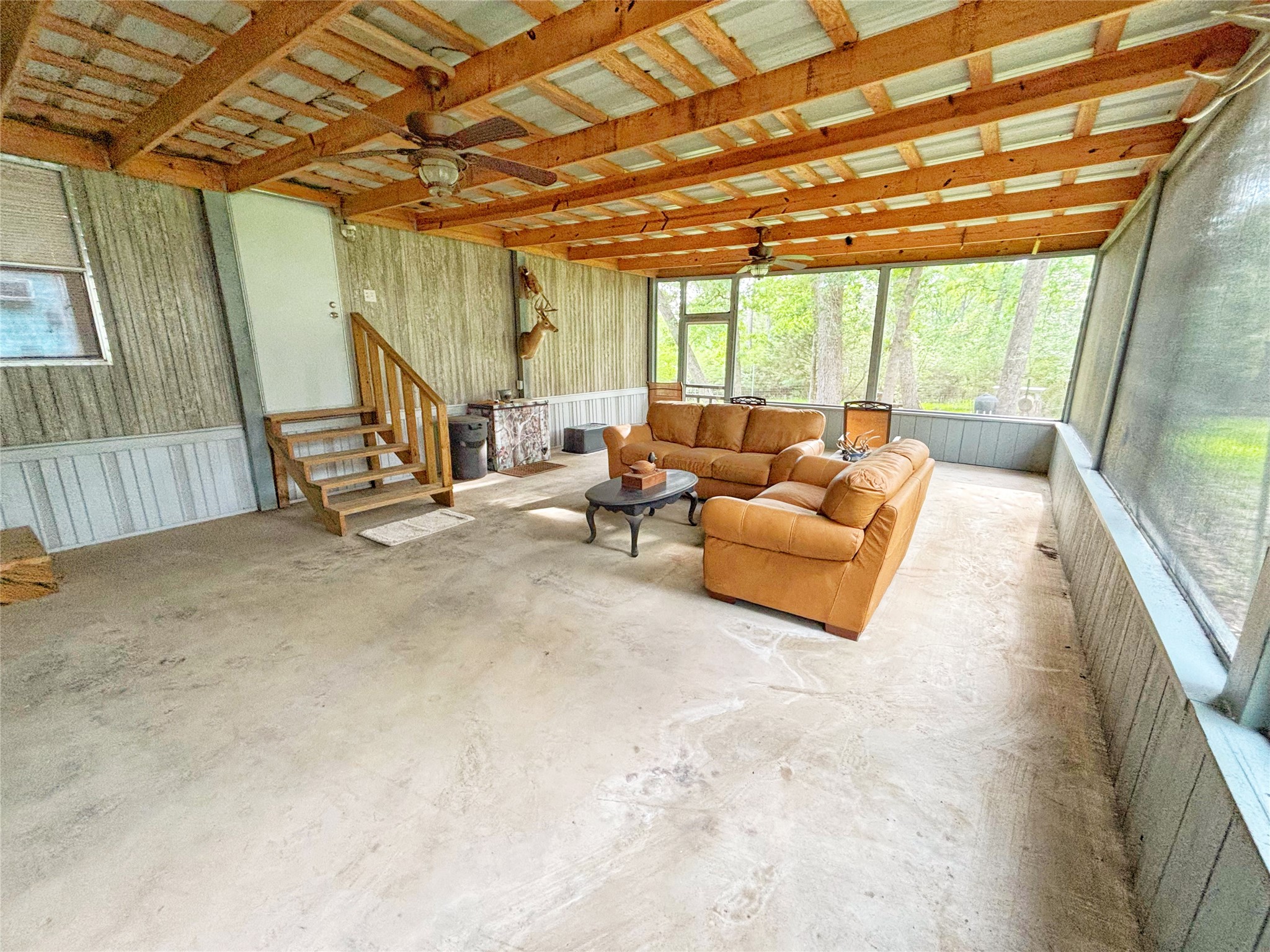 8 River Drive Trinity, TX 75862 - Photo 20 of 36 a living room with furniture and a large window