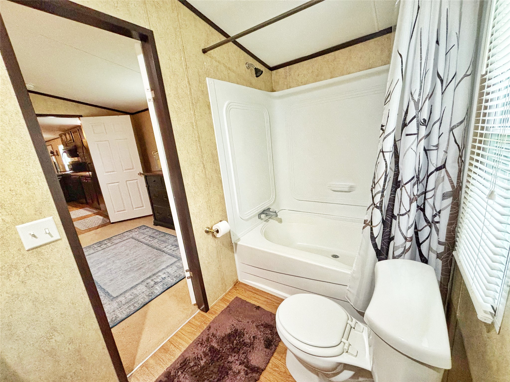 8 River Drive Trinity, TX 75862 - Photo 10 of 36 a bathroom with a toilet a sink and a shower