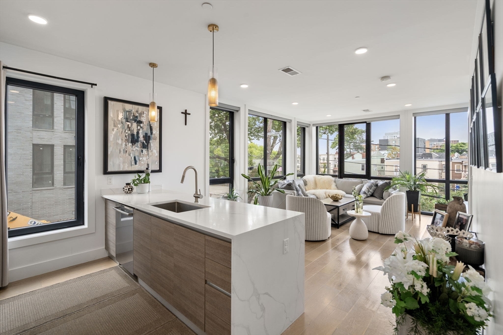 a large living room with large windows