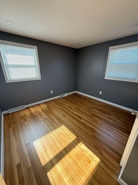 108 Reed Street, Unit R Randolph, MA 02368 - Photo 6 of 21 a view of wooden floor