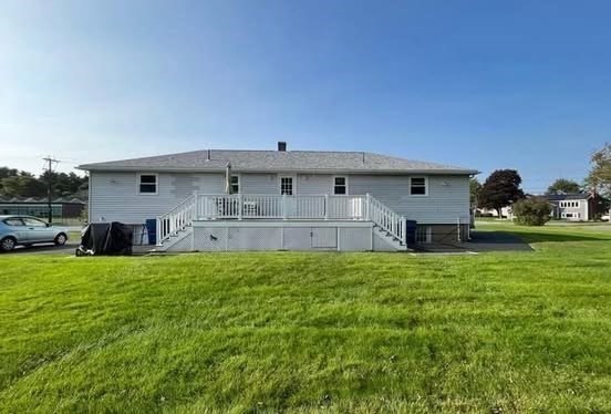 108 Reed Street, Unit R Randolph, MA 02368 - Photo 10 of 21 a front view of house with yard and car parked