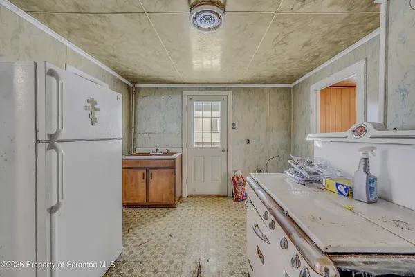 a bathroom with a sink and toilet