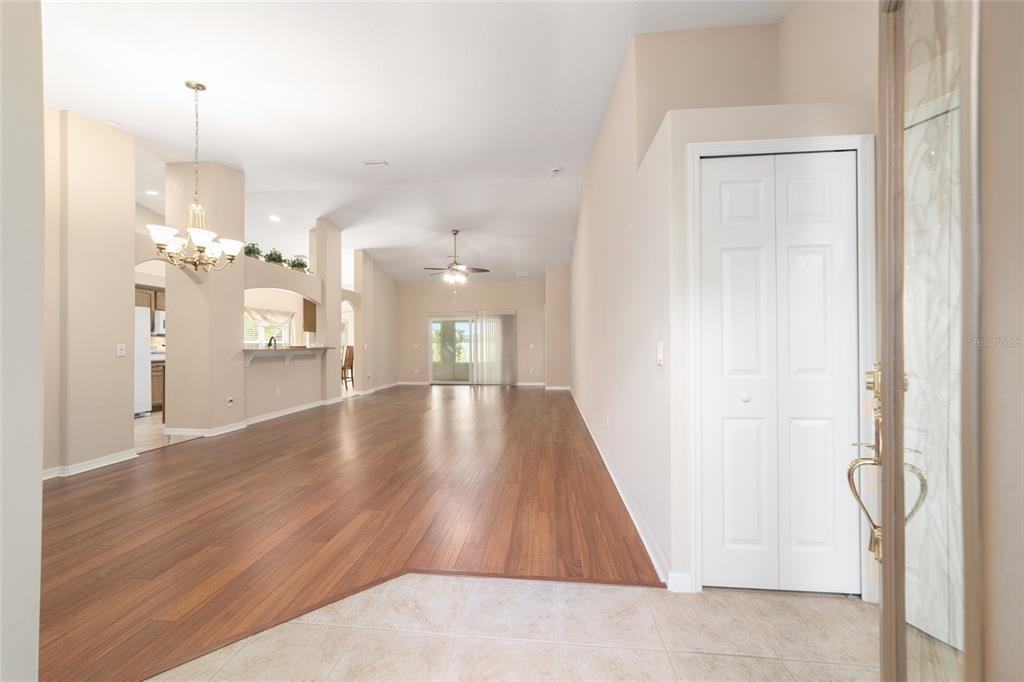 16369 Southwest 14th Avenue Road Ocala, FL 34473 - Photo 7 of 49 a view of a hallway view with wooden floor and staircase