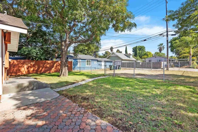 a view of a yard with a slide