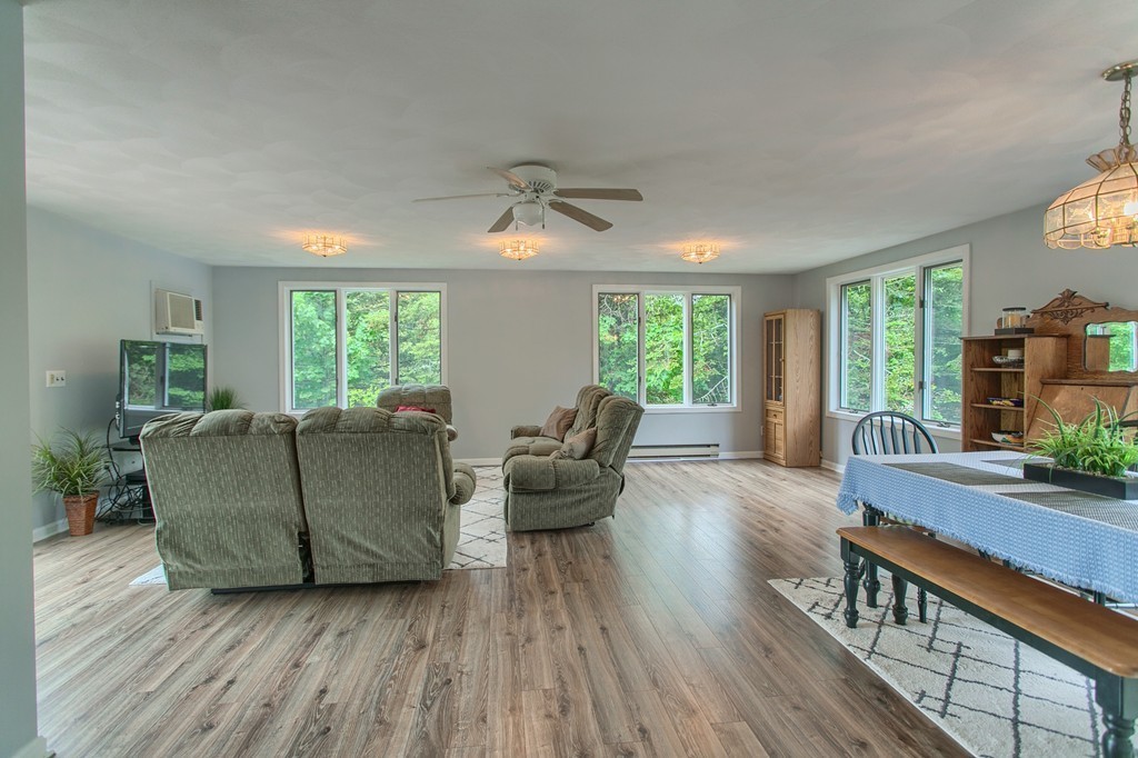 8 Freeman Road Chelmsford, MA 01824 - Photo 8 of 26 a living room with furniture and a window