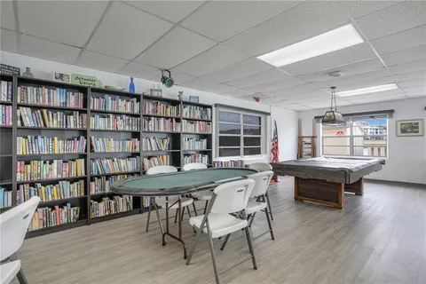 a view of a livingroom with furniture and furniture
