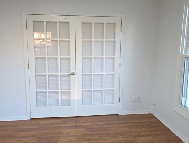 a view of wooden floor in an empty room