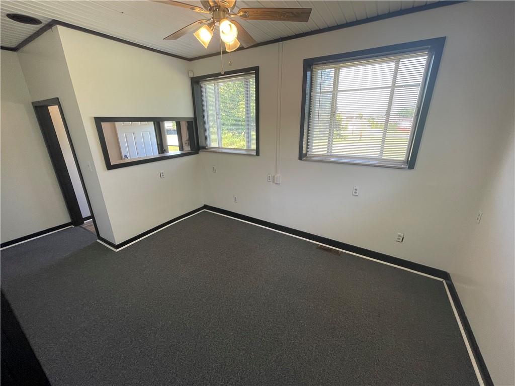 10 Rhoda Street Farrell, PA 16121 - Photo 14 of 26 an empty room with windows and painted walls
