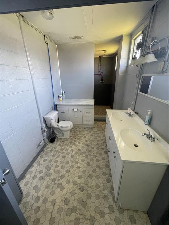 10 Rhoda Street Farrell, PA 16121 - Photo 17 of 26 a bathroom with a sink and a toilet