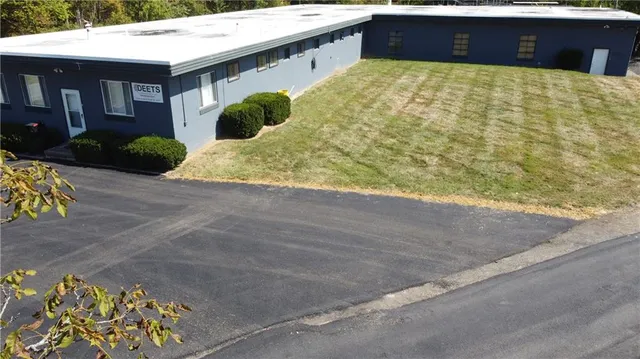 a view of an empty room with a yard