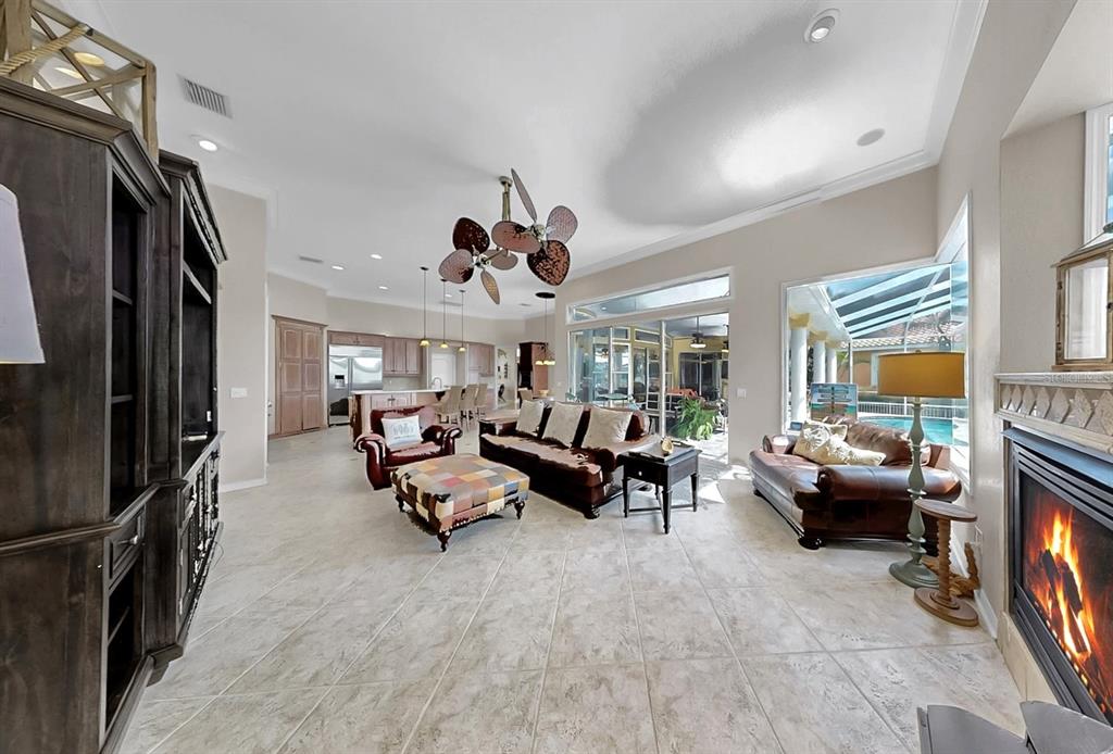 914 Capriccio Lane Apollo Beach, FL 33572 - Photo 37 of 75 a living room with furniture and a flat screen tv