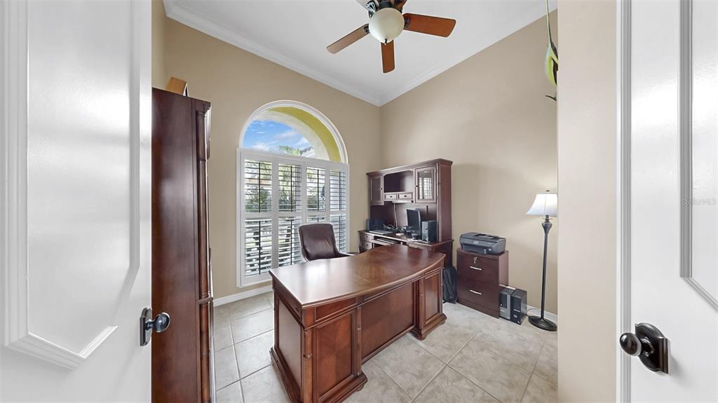 914 Capriccio Lane Apollo Beach, FL 33572 - Photo 38 of 75 a living room with furniture and a large window