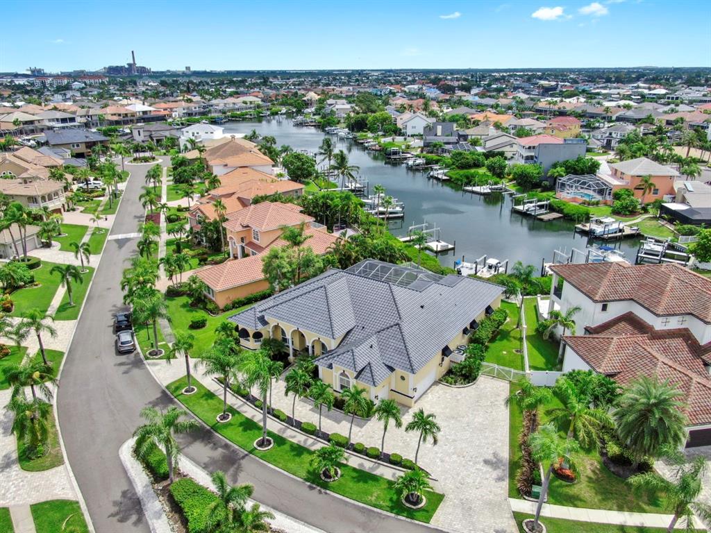 914 Capriccio Lane Apollo Beach, FL 33572 - Photo 7 of 75 an aerial view of a house with a garden