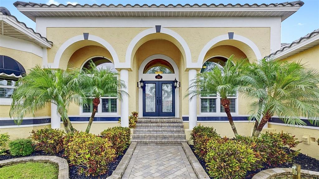 914 Capriccio Lane Apollo Beach, FL 33572 - Photo 10 of 75 a house view with a garden space