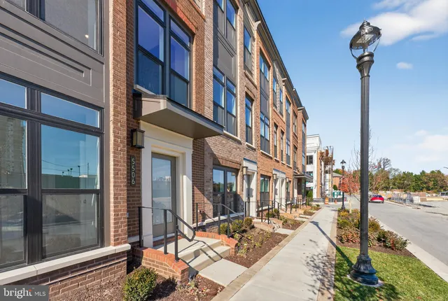 a view of a building with a street