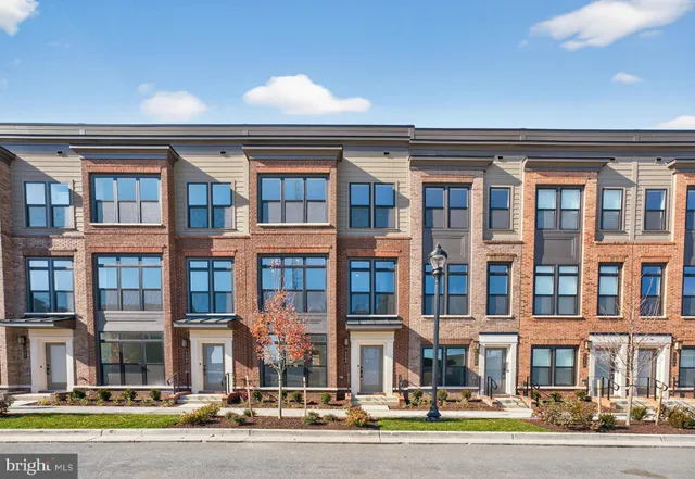 a front view of a multi story building