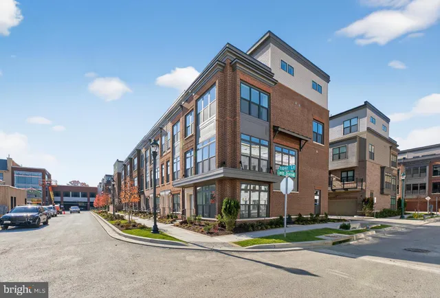 a front view of a building with street view