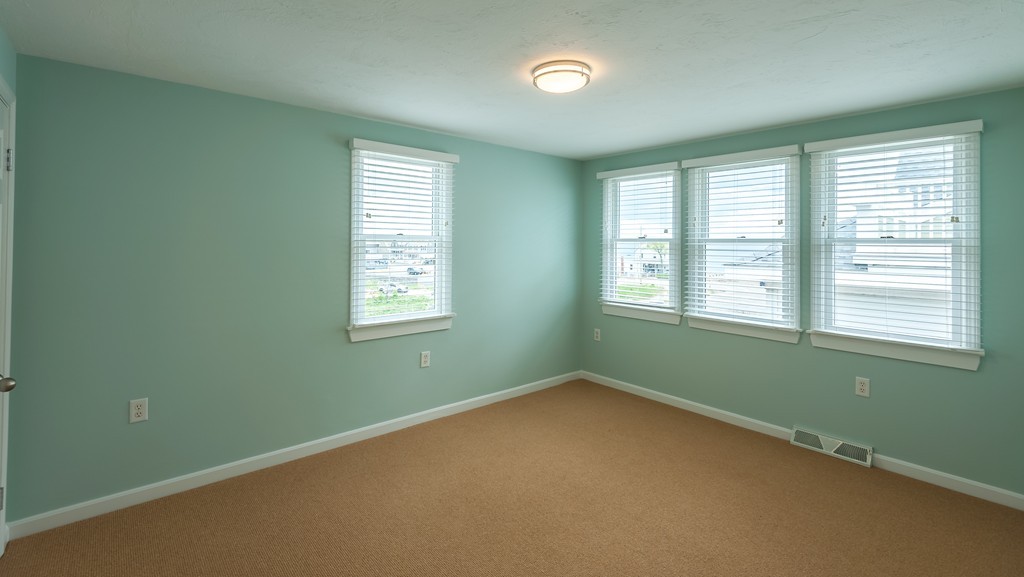 149 Jericho Road, Unit B Scituate, MA 02066 - Photo 16 of 22 an empty room with a window and closet